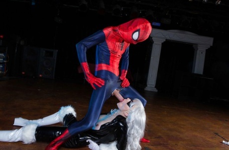 Blonde latex attired cosplay enthusiast with big tits giving big cock a bj 94215361